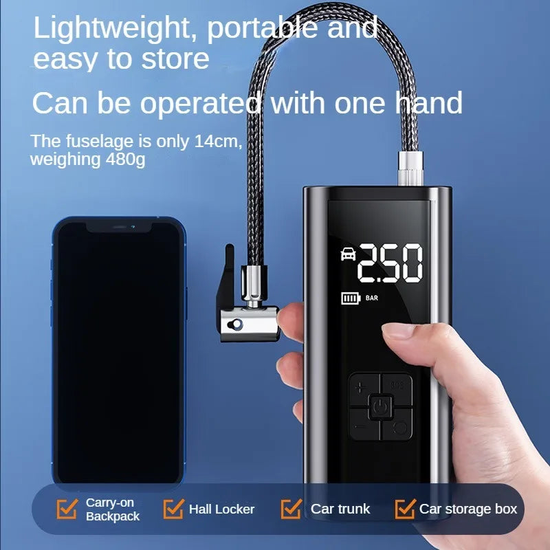 A hand holds a portable tire inflator air compressor device with a black cord, demonstrating its one-hand operation.