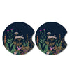 A pair of dark blue coasters featuring a botanical pattern of various dried flowers and greenery.