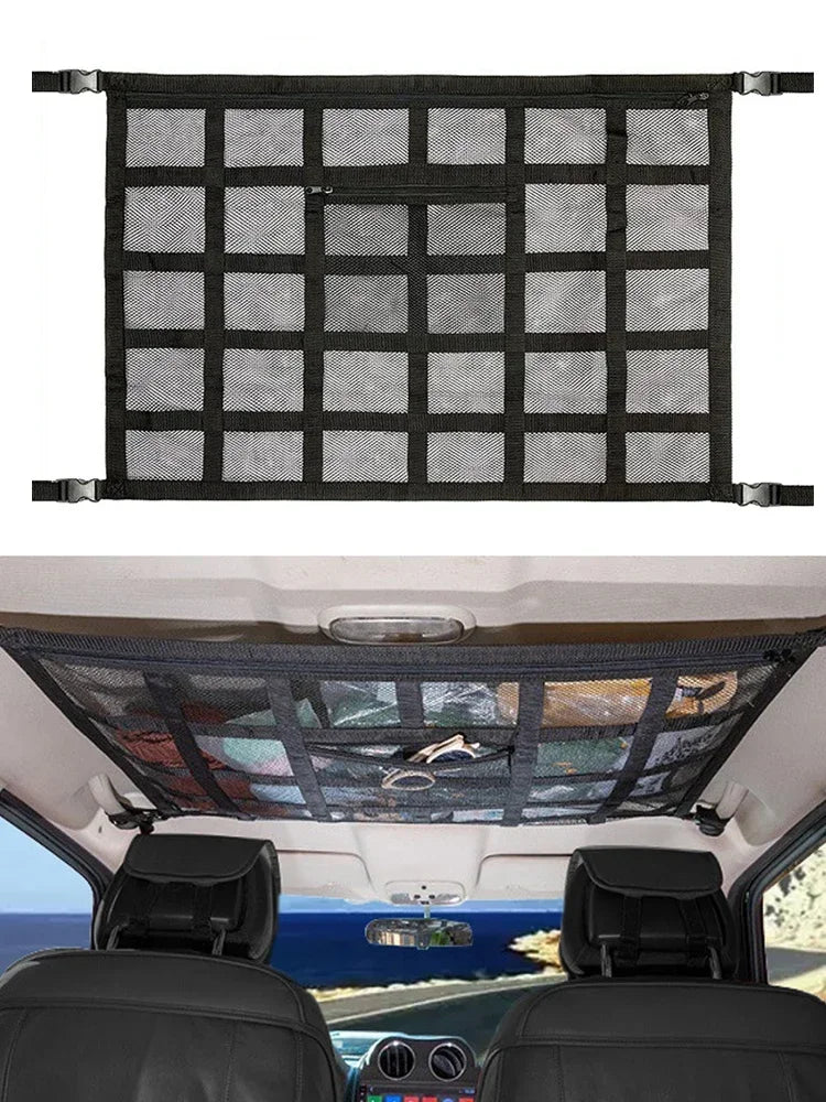 A black heavy-duty cargo net is installed in the interior of a vehicle, likely an SUV or truck.