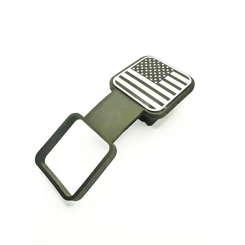 A dark olive green universal trailer hitch cover featuring a black and white American flag design.