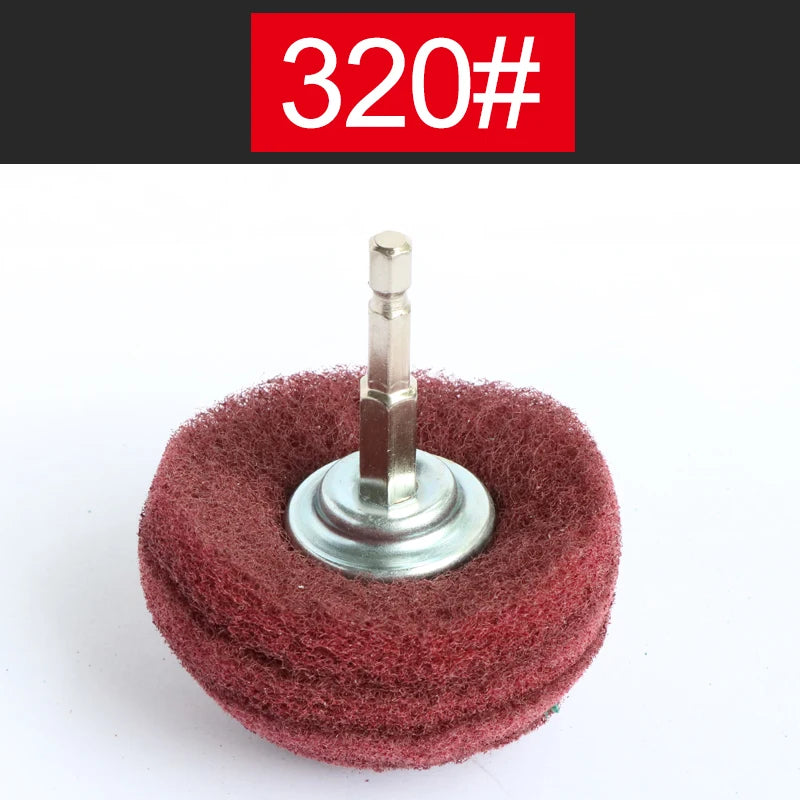 A precision flap sanding wheel with a metal shaft mounted on a red felt sanding disc.