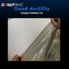 A hand is holding a clear automotive tint film, demonstrating its good ductility for car lights.