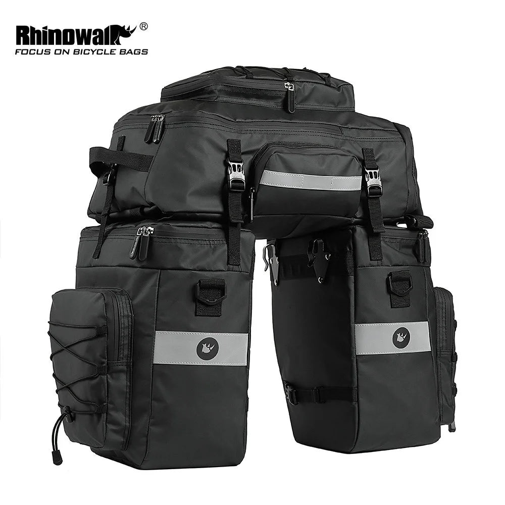 A set of three black mountain bike trunk bags with gray accents.