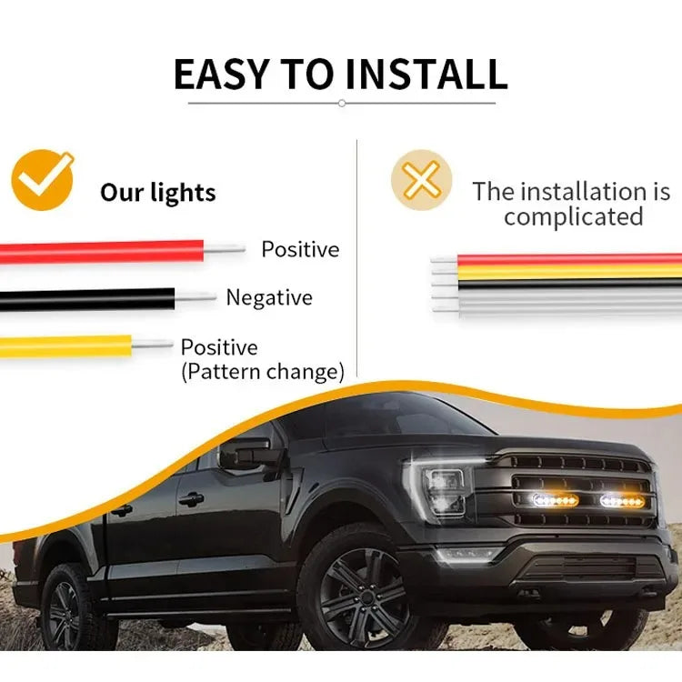 Feux stroboscopiques doubles installés sur la calandre d'un pick-up noir.