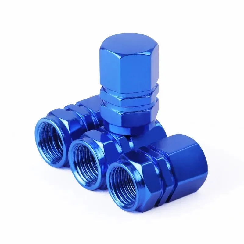 A set of blue aluminum valve caps for wheels and tires, showing various sizes.