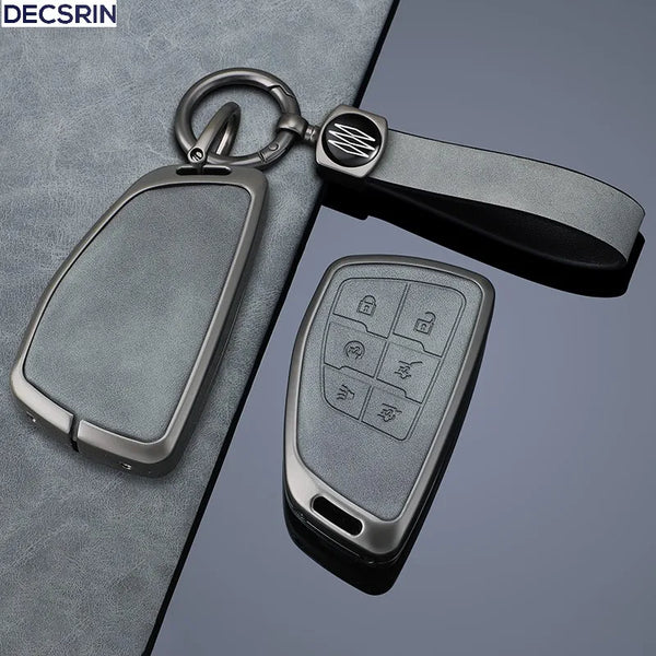 A silver multi-button car key case cover attached to a black lanyard and clip.