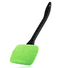 A bright lime green long-handle car window cleaning brush with a black handle.