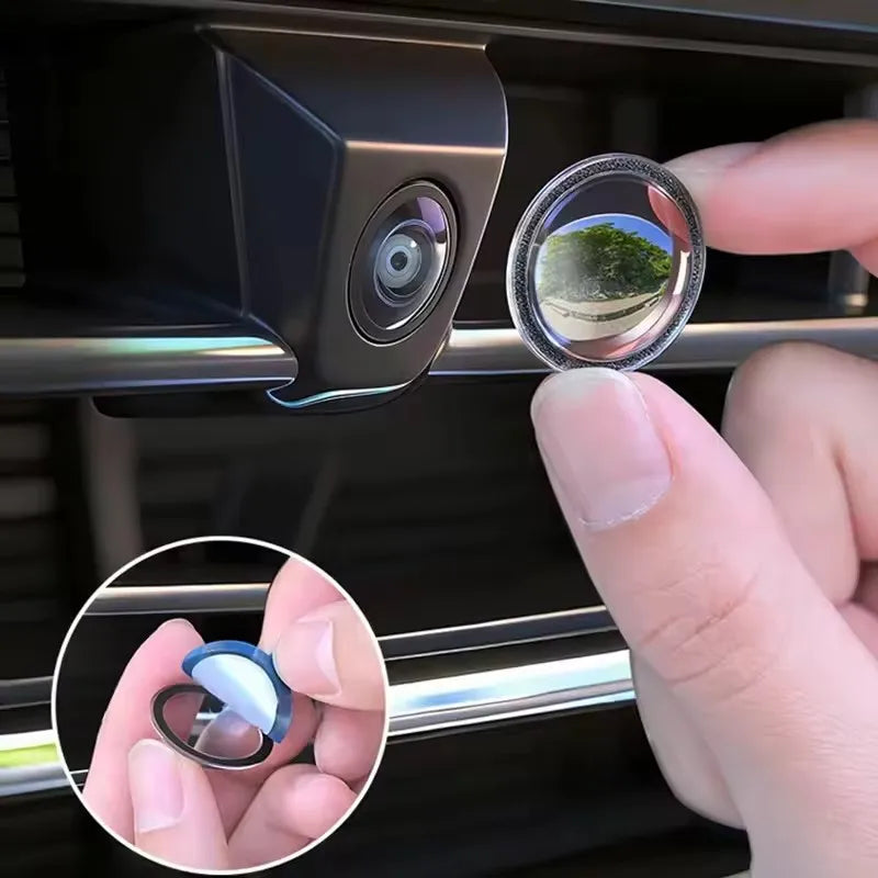A hand is holding a clear lens protector for a car camera, showing its protective design.