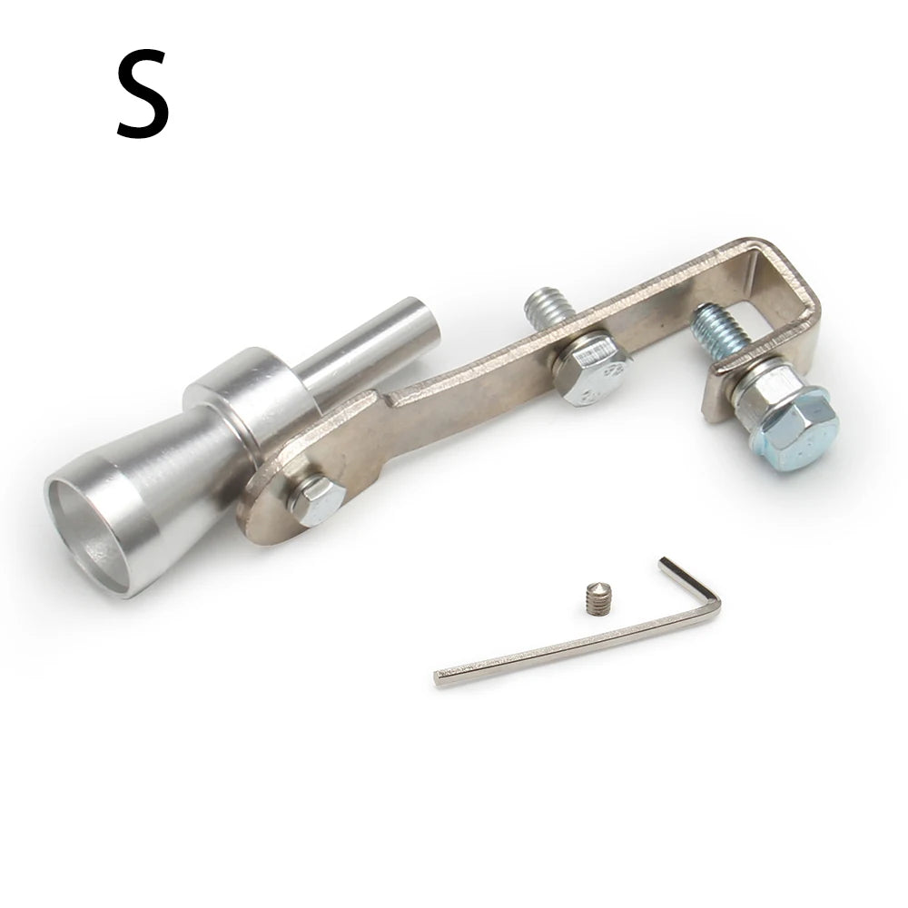 A silver universal turbo exhaust whistle with mounting hardware and a separate metal clip.