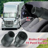 A close-up view of an 11-point brake caliper socket for European trucks, showing the tool and a truck cab.
