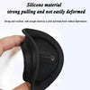 A hand is holding a black silicone material product, demonstrating its strong pulling and non-deforming properties.