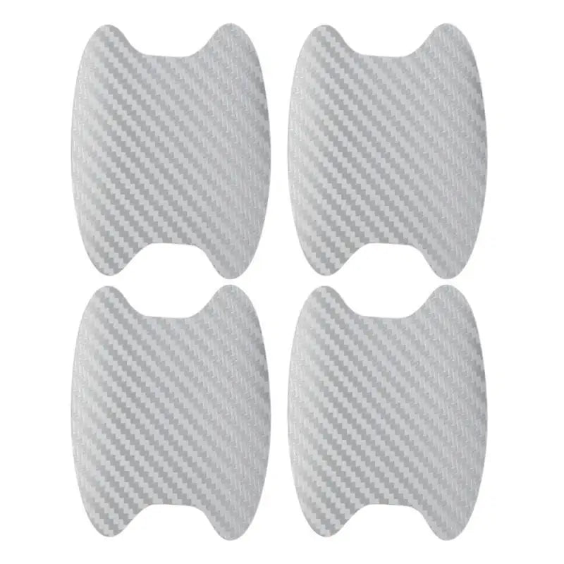 A set of car door handle protection film, showing four individual pieces.