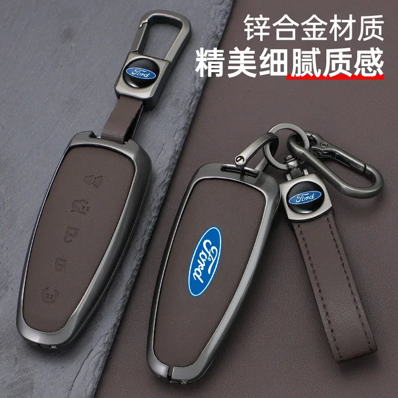 A dark brown Ford car key cover made of zinc alloy and leather, shown against a gray background.
