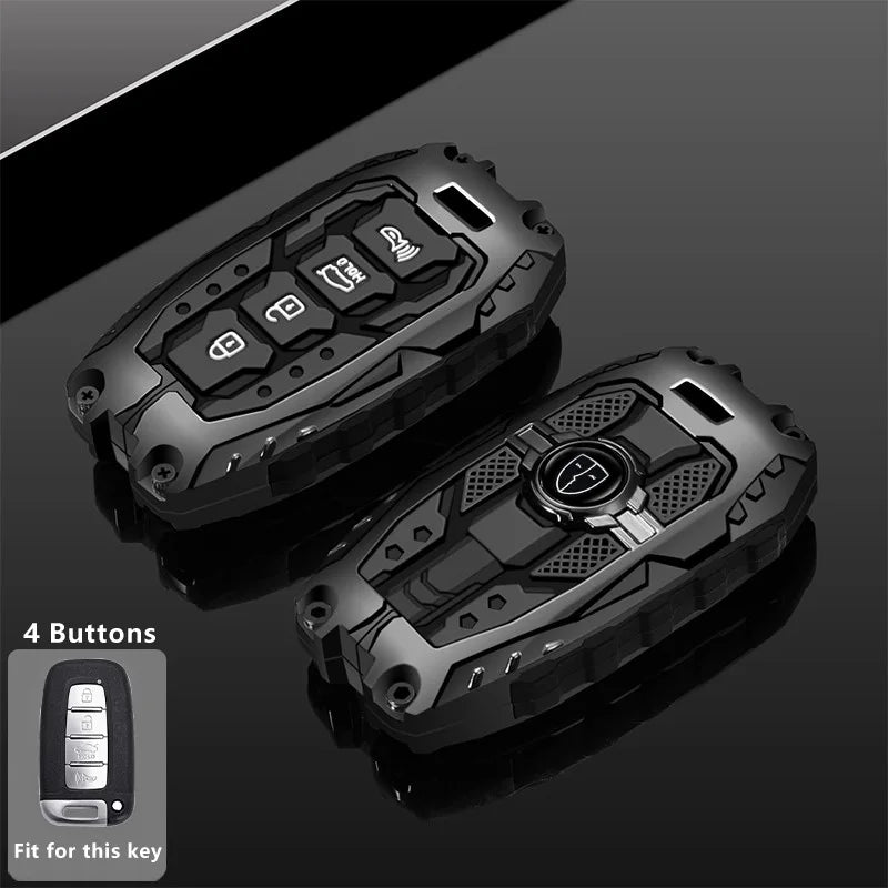 A black universal car key fob cover with four buttons shown on a dark surface.