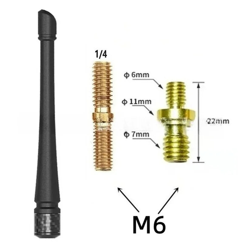A set of threaded antenna components including a black shaft and brass fittings for a car radio aerial kit.