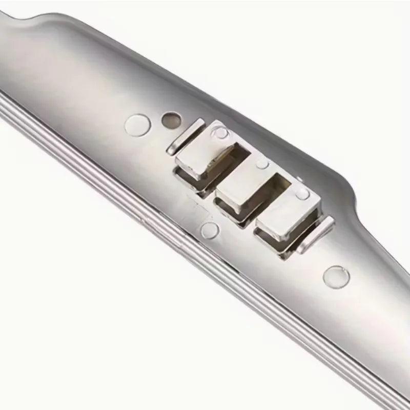 Close-up view of a silver car wiper pressure regulator booster device.