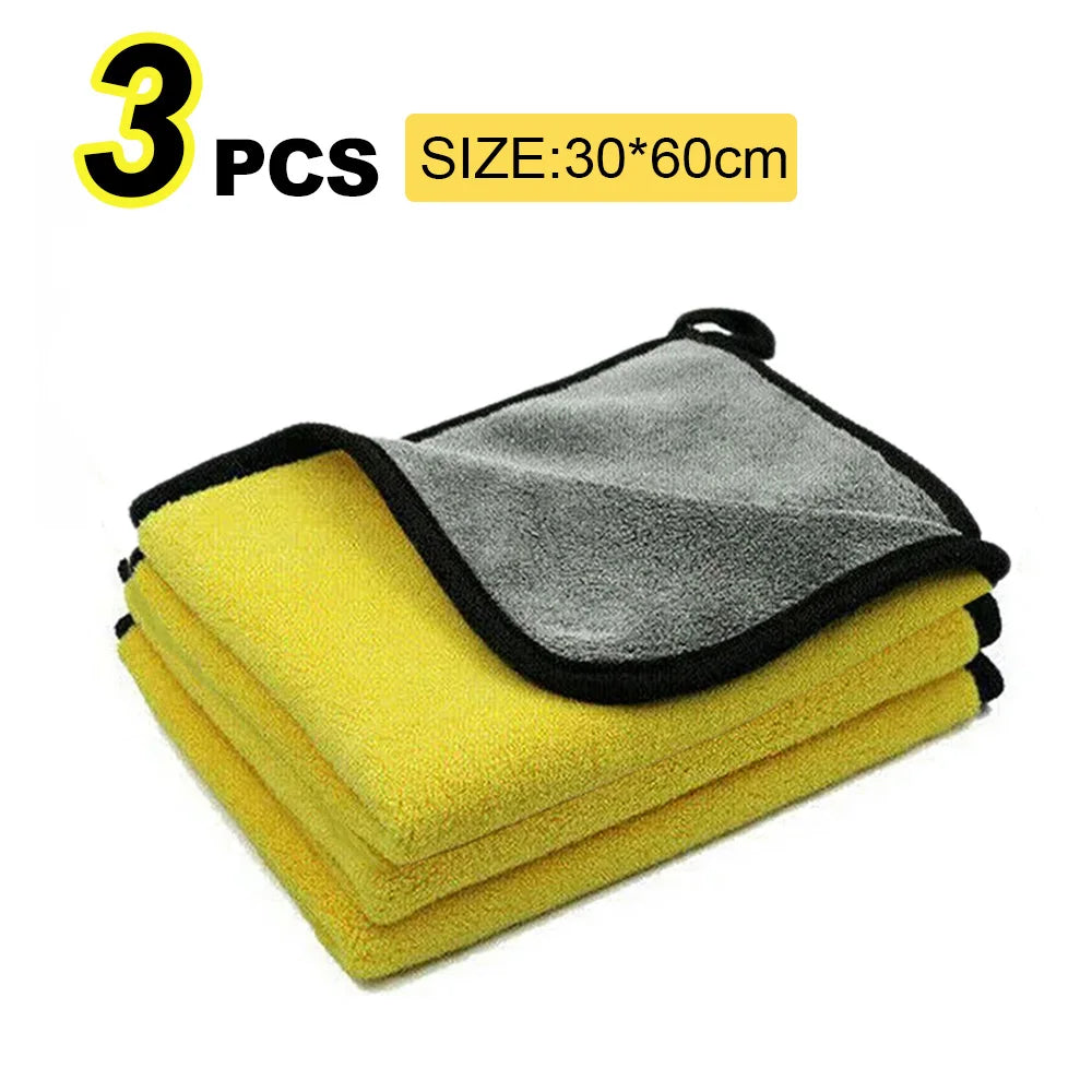 Three yellow and gray microfiber car washing towels stacked together.