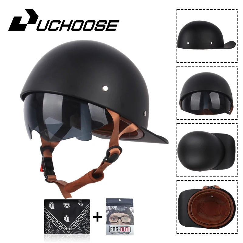 A black vintage open-face motorcycle helmet with a brown leather strap and included accessories.