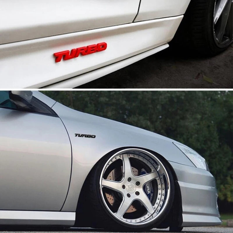 Close-up of a white car fender with a red TURED badge and a silver sports car with a turbo emblem.