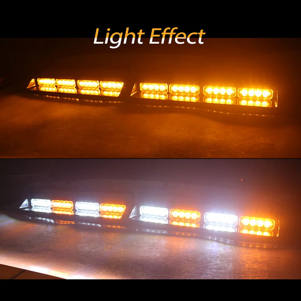 A close-up view of emergency dash strobe lights illuminating a dark surface.