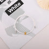 A white heart-shaped fitness tracker bracelet is shown on a white background with a black label reading White.