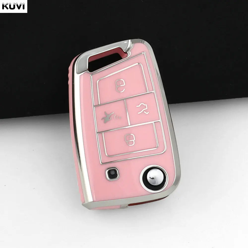 Rosa TPU Auto-Schlüssel-Cover mit verschiedenen Ausschnitten und einem runden Knopf vor dunklem Hintergrund