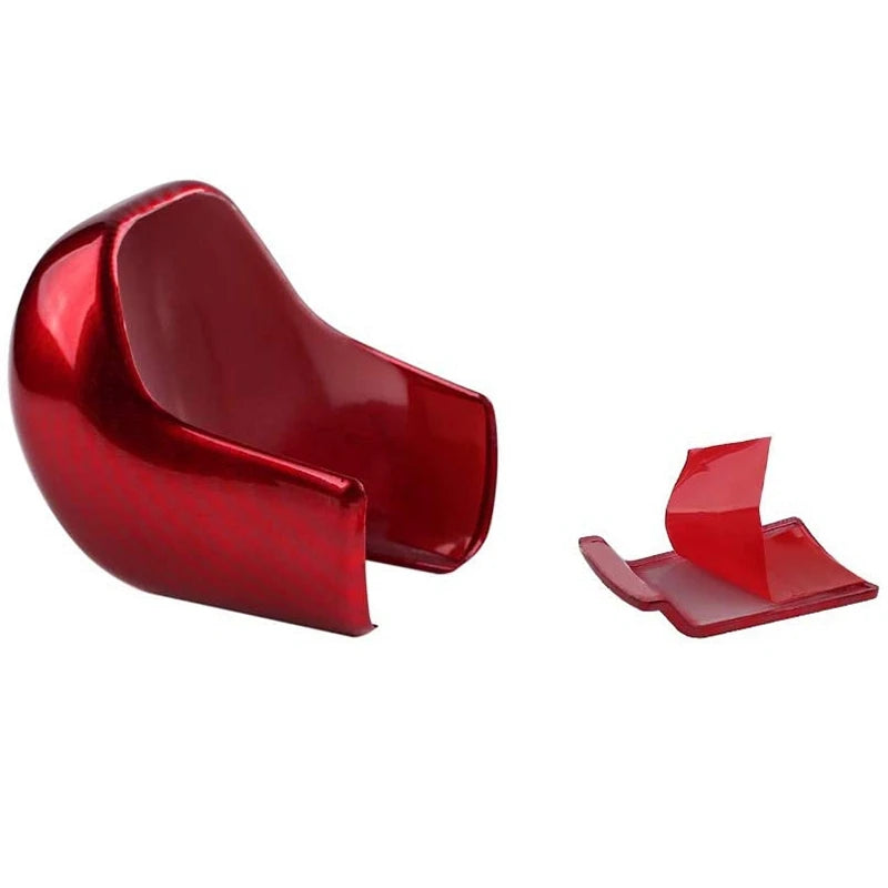 A glossy red carbon fiber gear shifting knob cover for a Honda Civic.