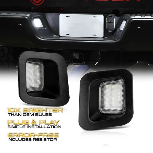 A close-up view of an LED license plate light assembly for trucks, showing the light units and mounting bracket.