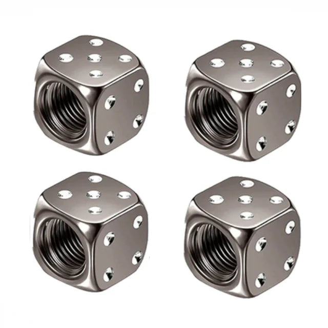 A set of four hexagonal aluminum alloy tire valve caps with threaded openings.