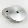 A modern stainless steel pendant lamp component, showing a circular disc with a central hole.