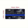 A black and gray decorative aluminum flag sign featuring the American flag design with a blue stripe.