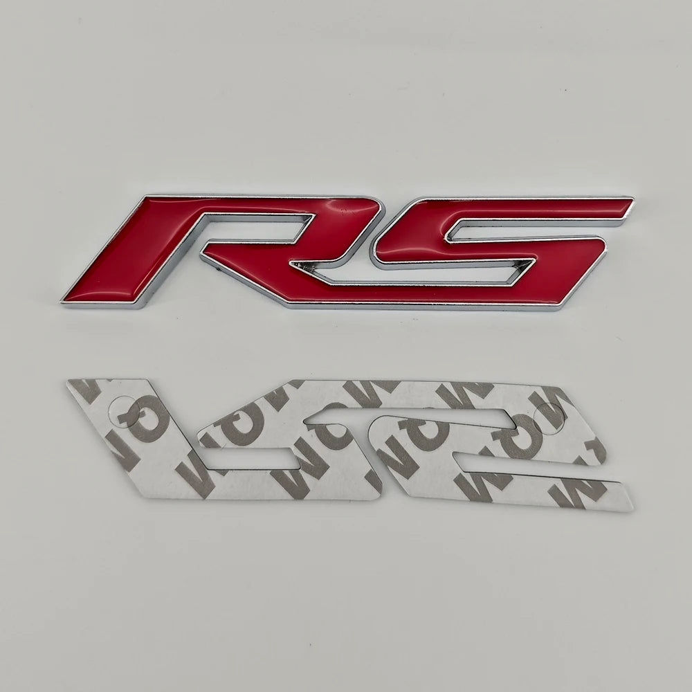 A red and silver 3D metal SS/RS emblem badge for Chevrolet vehicles.