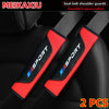 Two red and black PU leather carbon fiber seat belt shoulder guards for car seats