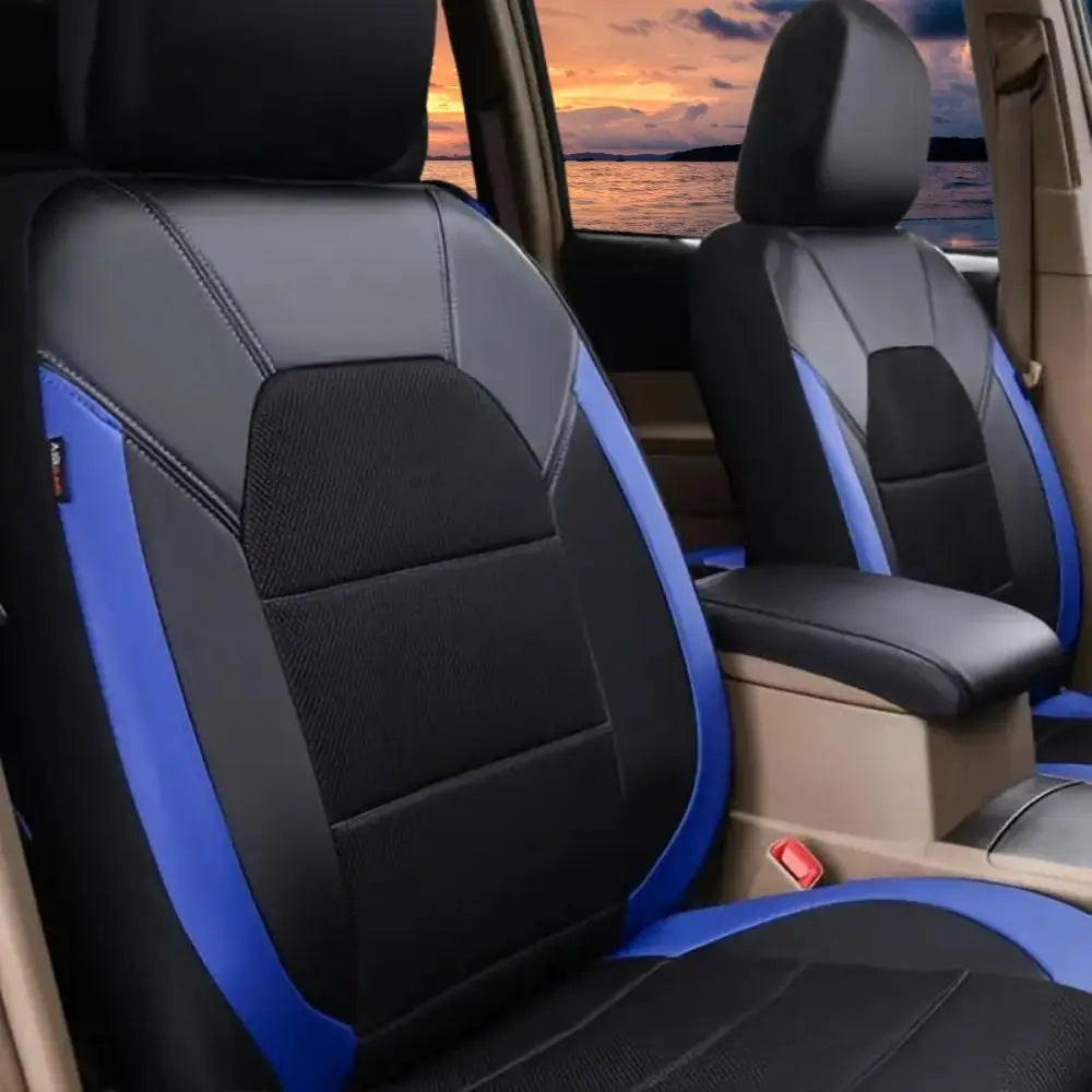 Black and blue PU leather breathable car seat covers installed in a vehicle interior.