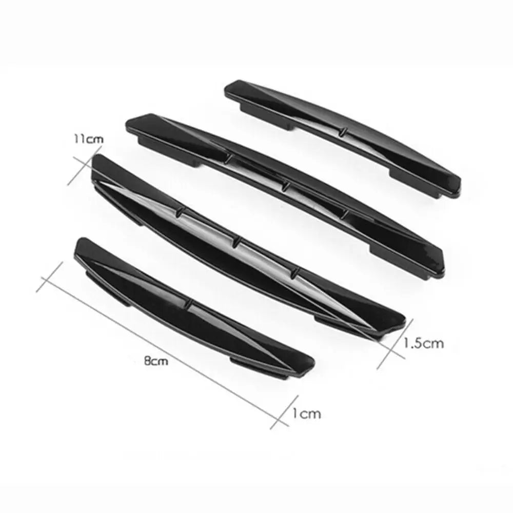 A set of four black car door edge protector strips for anti-scratch guard trim.
