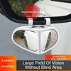 A white double mirror with a visual field blind area is mounted on a car window for improved visibility.
