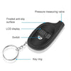 A black digital tire pressure gauge with a measuring valve, LCD display, switch, and key ring attached.