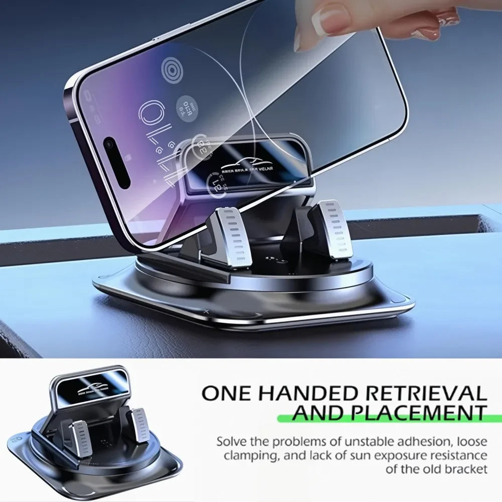 A hand places a smartphone onto a silver rotating mount designed for secure placement on a car dashboard.