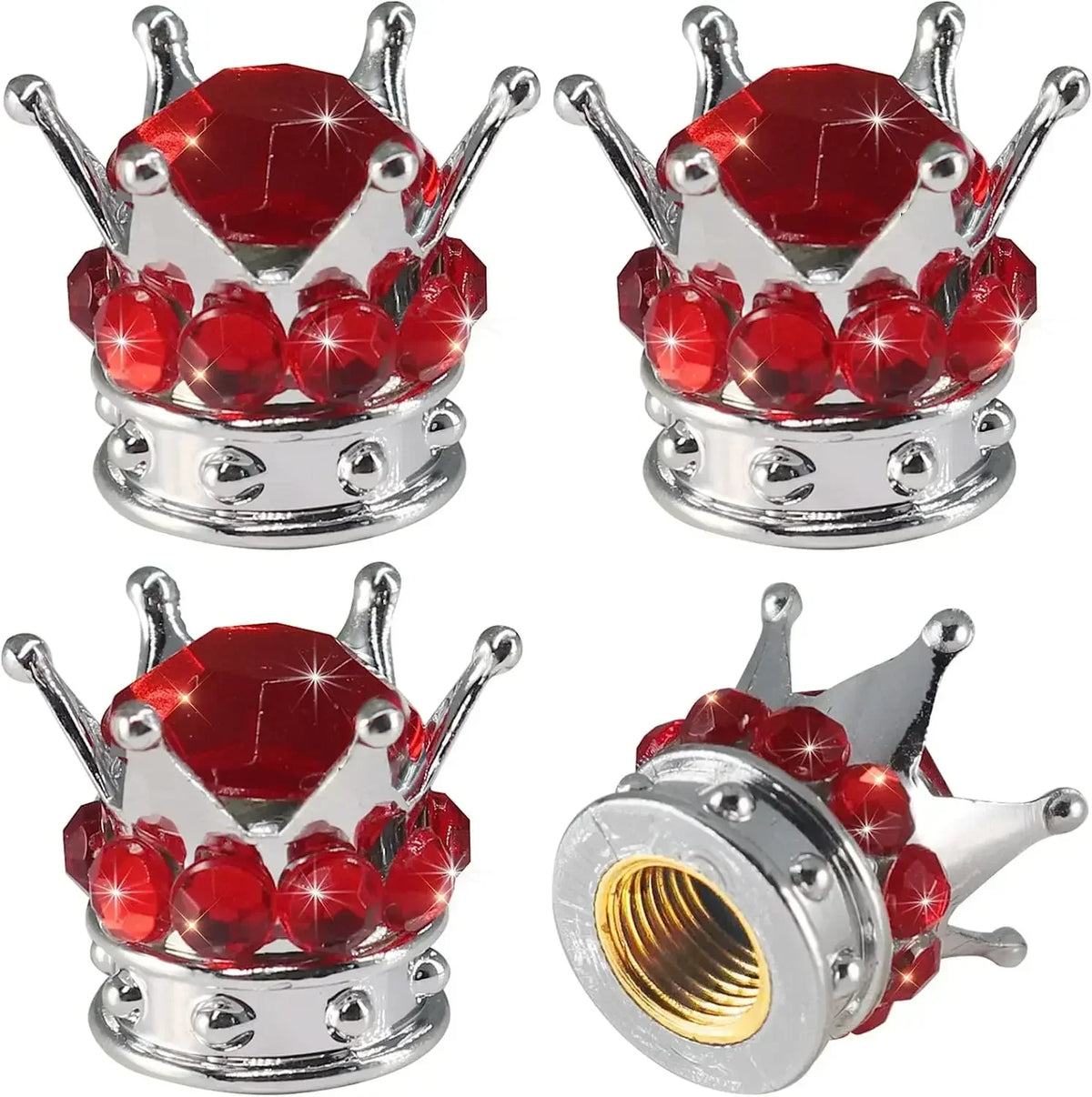 A set of silver tire valve caps decorated with red rhinestones and a diamond-shaped top.
