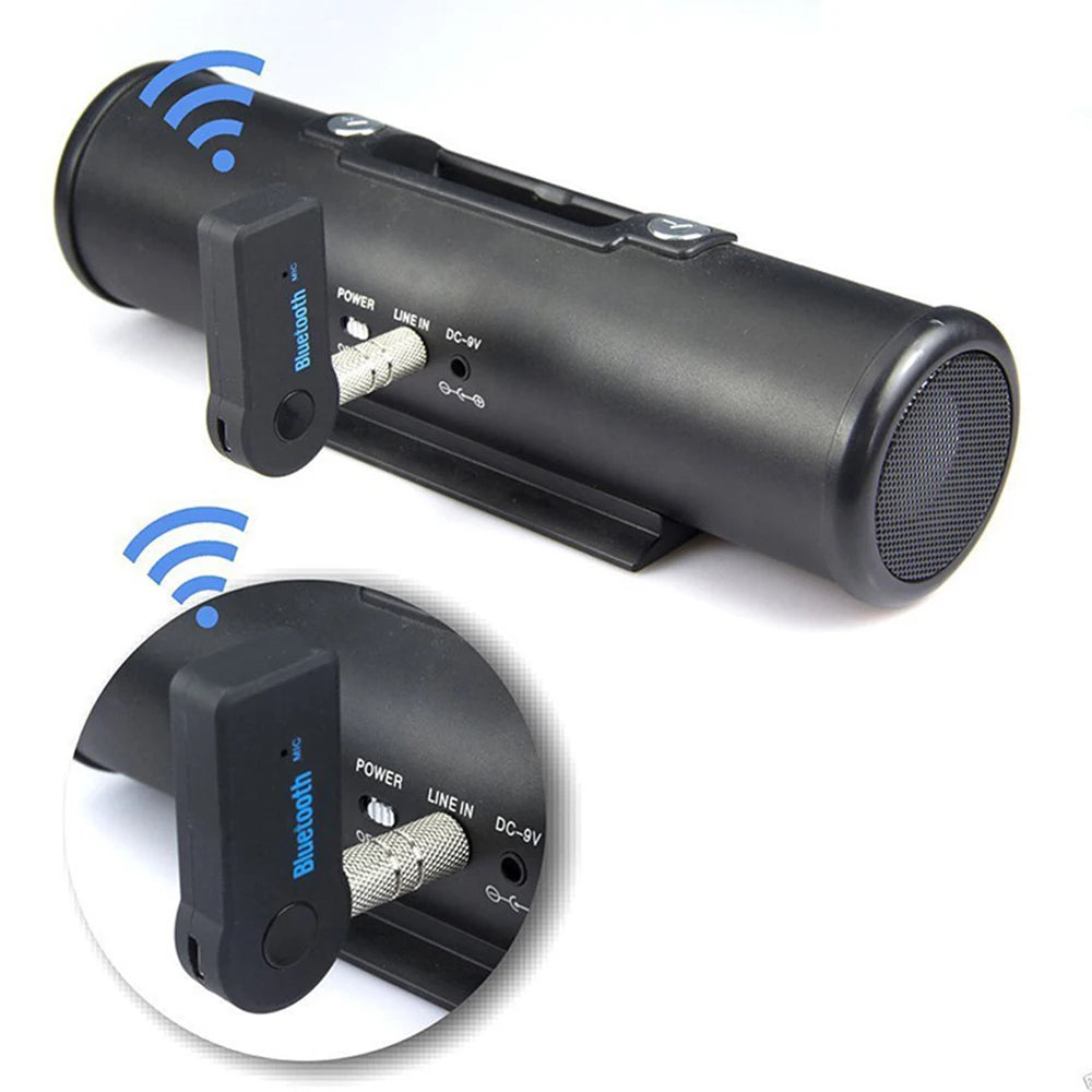 Adaptateur audio Bluetooth noir, montré sous deux angles : unité principale et accessoire circulaire.