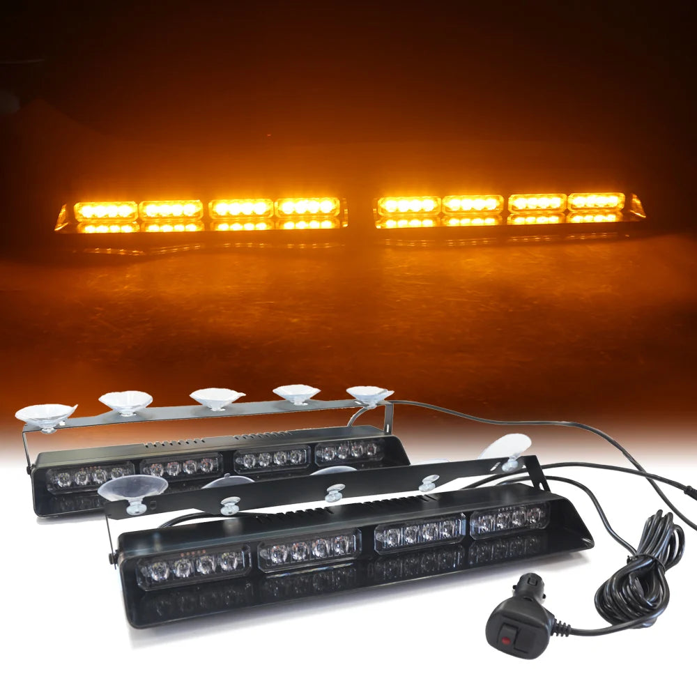 A set of emergency dash strobe lights mounted on a black panel, illuminated brightly against a dark background.