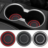 A set of two silicone car cup holder coasters shown in various views.