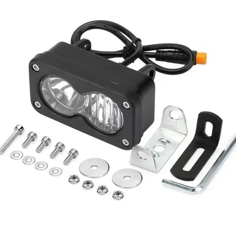 Black high-intensity LED motorcycle spotlight headlight with wiring and mounting hardware.