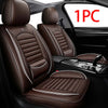 A pair of brown leather car seat covers for an SUV or sedan, shown in the interior of a vehicle.