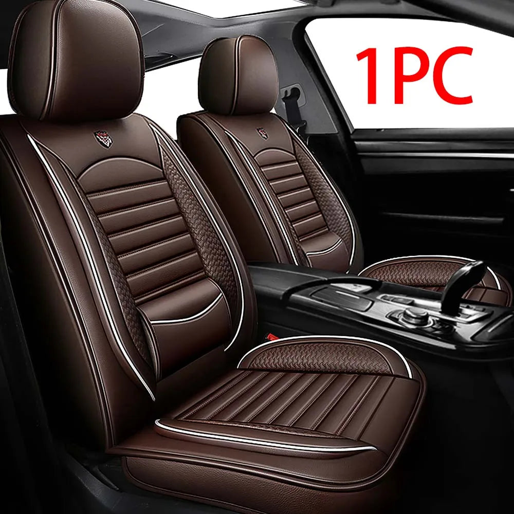 A pair of brown leather car seat covers for an SUV or sedan, shown in the interior of a vehicle.