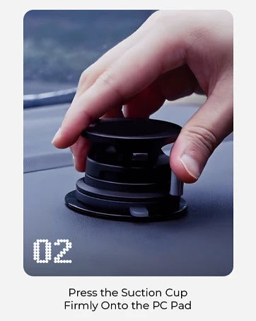A hand presses a suction cup onto a PC pad to attach a MagSafe car wireless charger.