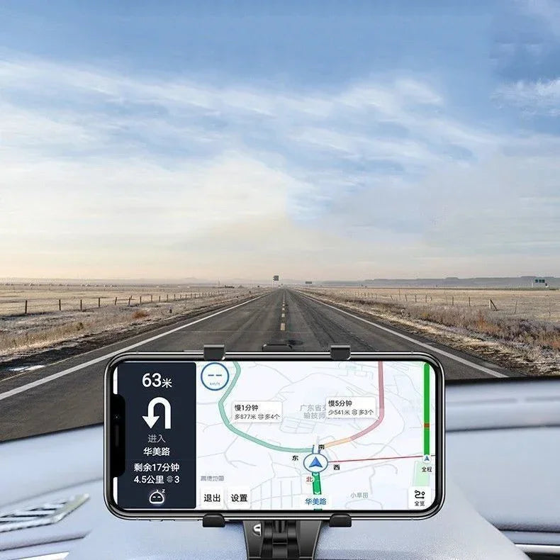 A phone mount displaying a map and navigation interface mounted on a car dashboard.