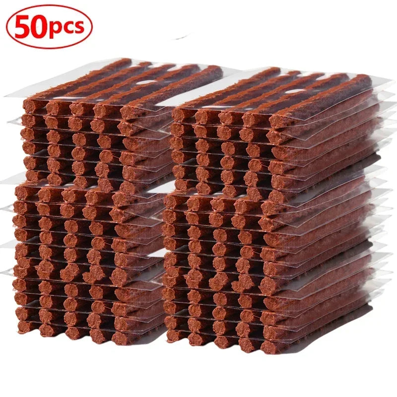 A stack of brown natural rubber tire repair strips packaged for sale.