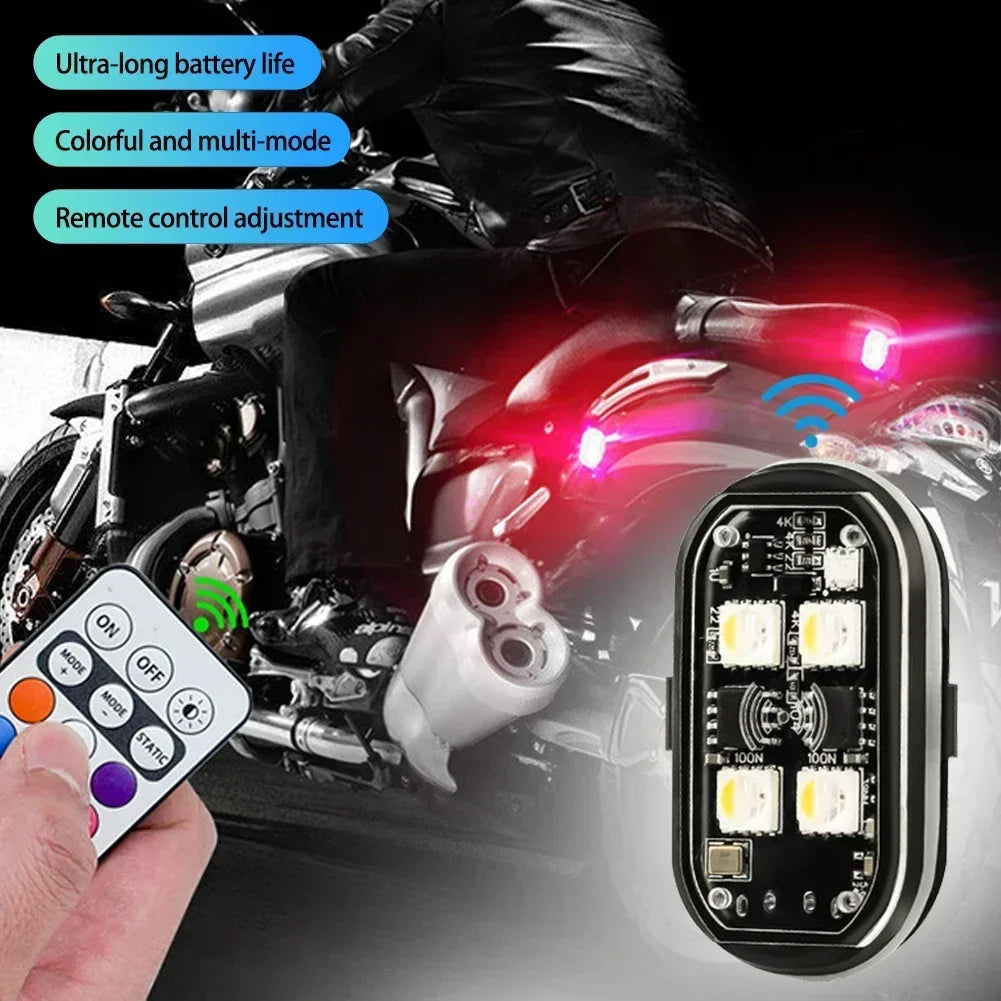 A hand holds a remote control device near an automotive light assembly with red and blue strobe lights.