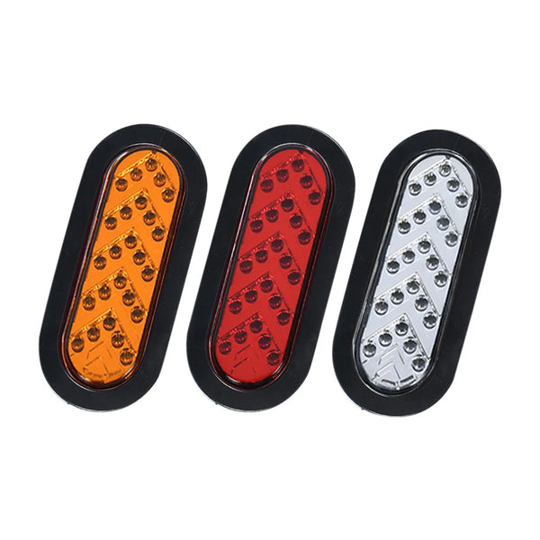 Three LED tail light assemblies in orange, red, and white for trucks and trailers